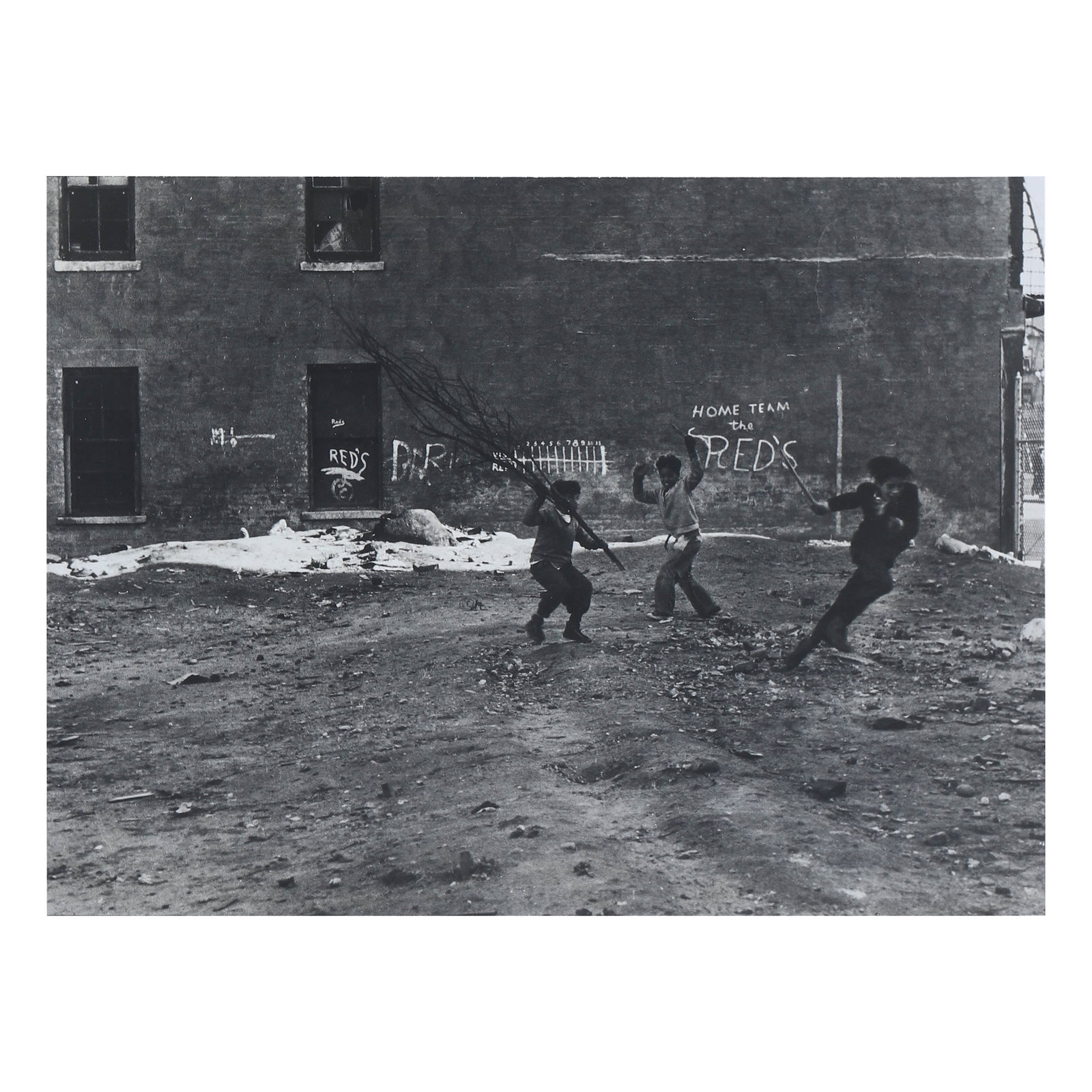 HELEN LEVITT (1913–2009), BOYS WITH BRANCHES, NEW YORK: Artist Helen Levitt (1913–2009) Title Boys with Branches, New York Medium Silver gelatin print, mounted on board Signature Signed on verso Dimensions Photograph: 8 5/8 × 6 3/8 in. (22 × 16.3 cm),