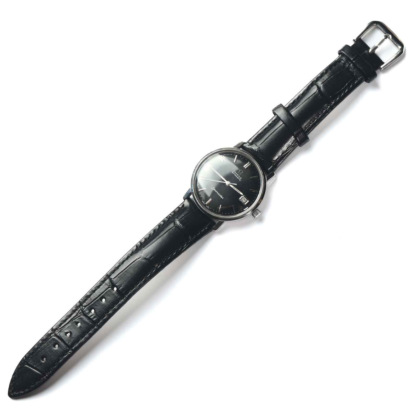 OMEGA SEAMASTER AUTOMATIC WRISTWATCH: Dimensions Dial Diameter 1 7/16 in. (36 mm). Length 9 3/8 in. (23.8 cm). Weight 24.3 g. Description A vintage Omega Seamaster Automatic wristwatch, Swiss made. Featuring a black dial with applied bato