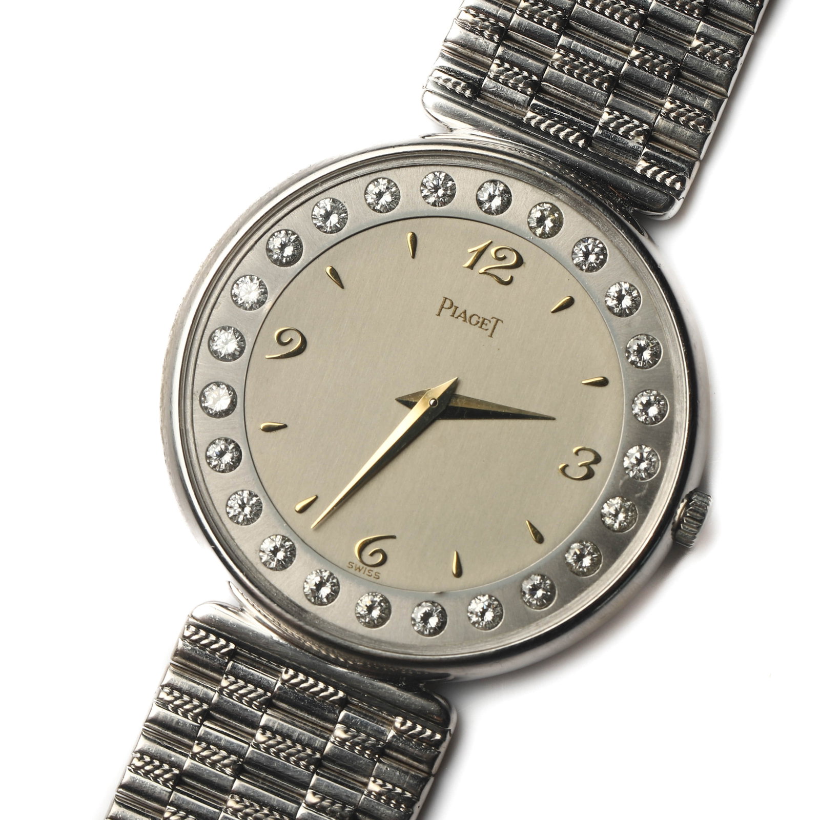 PIAGET 18K WHITE GOLD DIAMOND DIAL QUARTZ WRISTWATCH: Dimensions Dial Diameter: 1 5/16 in. (32.7 mm) Overall Length: 6 7/8 in. (17.5 cm) Weight: 74.7 g Description A Piaget quartz wristwatch crafted in 18K white gold, featuring a silver-tone dial with