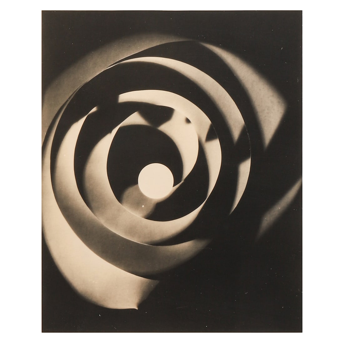 MAN RAY (1890–1976)RAYOGRAPH SPIRAL: Artist MAN RAY (1890–1976) Title RAYOGRAPH SPIRAL Medium Gelatin silver photograph, mounted on board Signature Signed in pencil, lower right Dimensions Image 8 1/8 × 10 1/8 in. (20.6 × 25.8 cm)Fra
