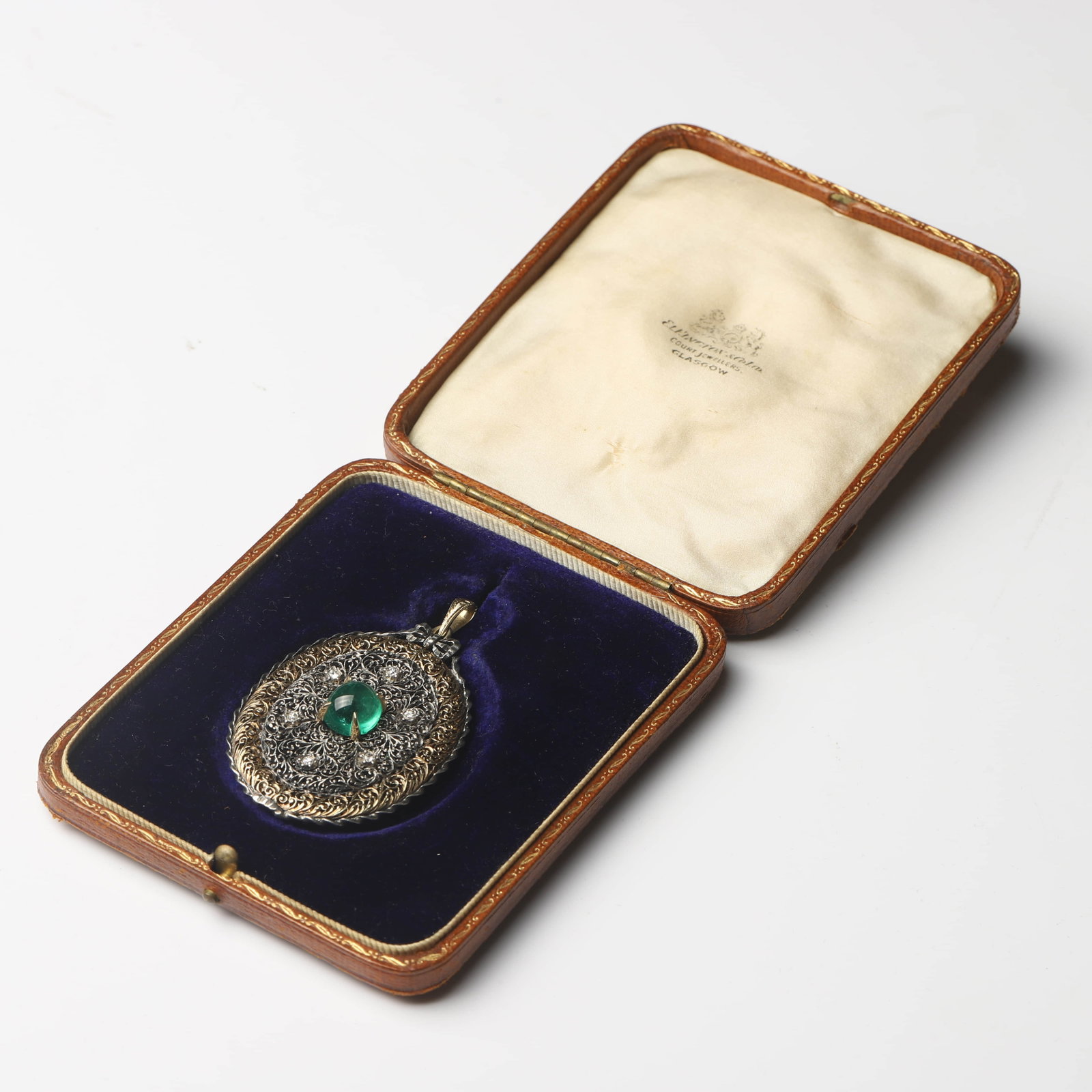 MUSEUM QUALITY, NAPOLEON III PERIOD (1852–1870), GOLD AND SILVER OPENWORK EMERALD AND DIAMOND: Dimensions Height: 2 7/16 in. (6.2 cm), Width: 1 9/16 in. (3.9 cm)Weight19.42 g Description A museum-quality French vinaigrette pendant from the Napoleon III period, representing the pinnacle of