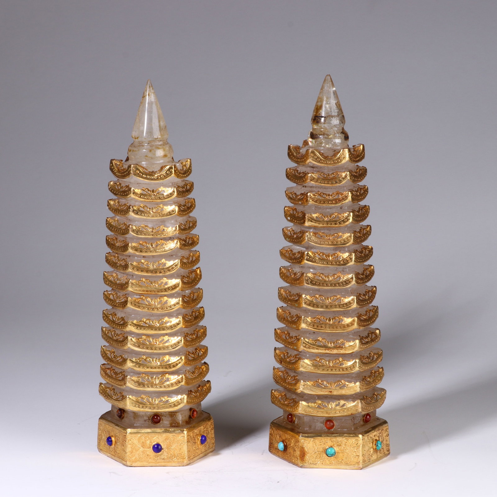 A pair of crystal stupas: 34cm high and 10cm wide
