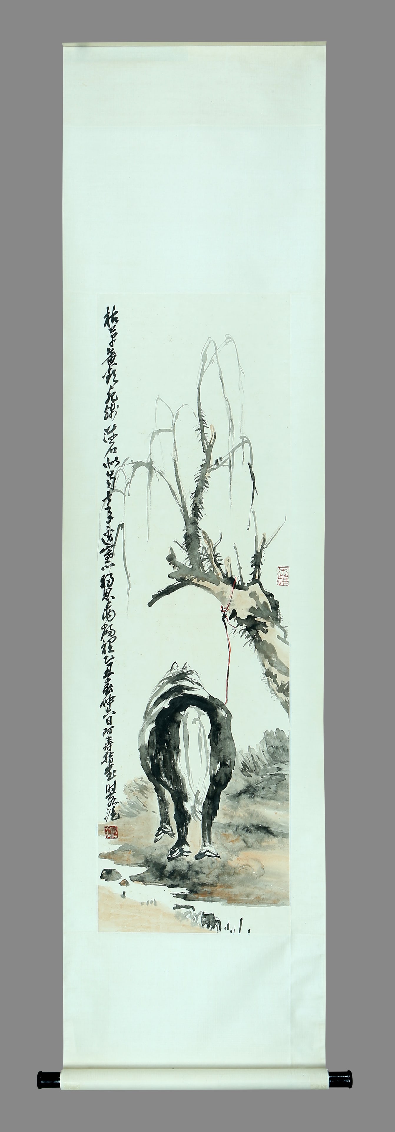 A vertical scroll painting of a horse by Pan Tianshou on paper: 130cm long, 38cm wide