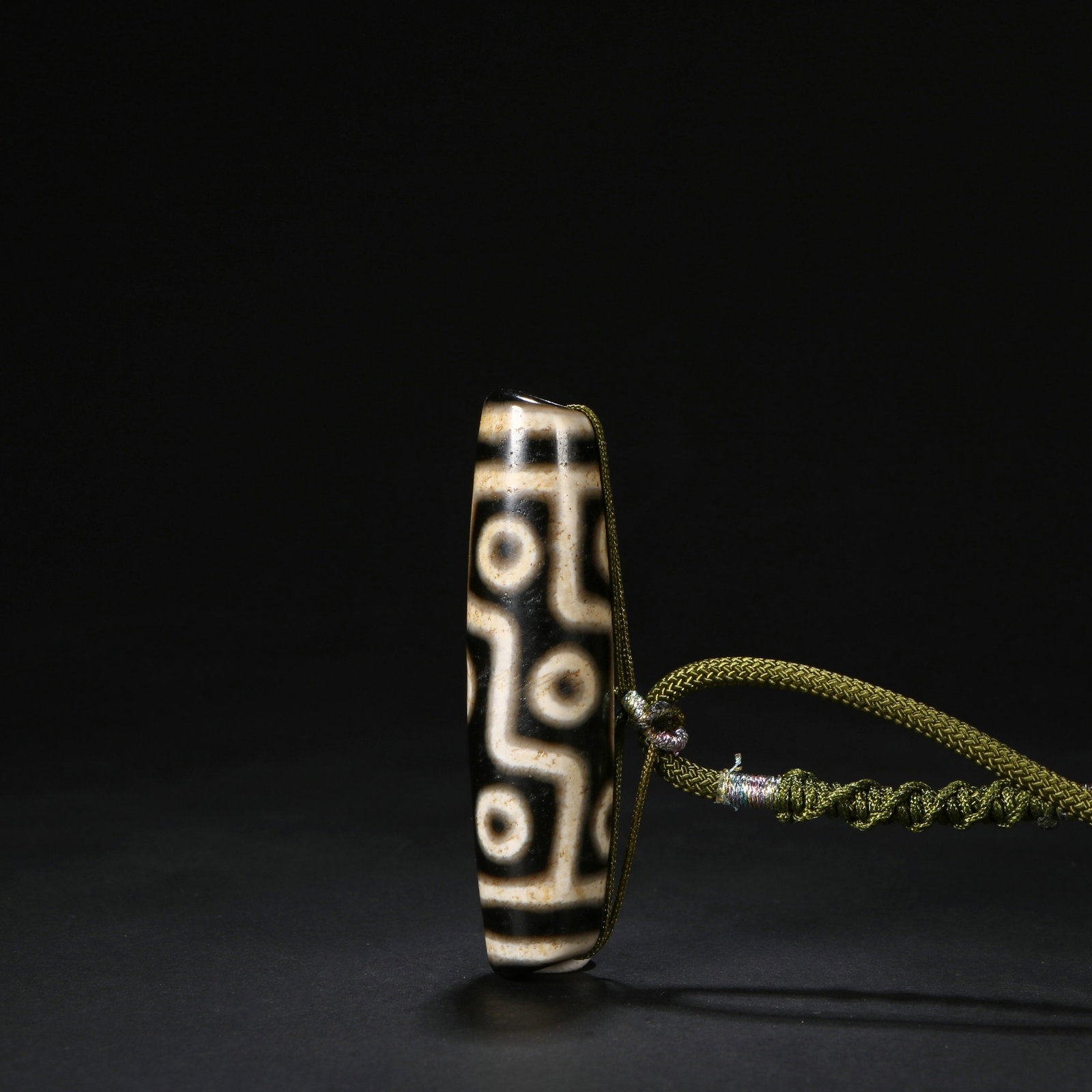 Dzi bead: Length 5.2cm, Width 1.5cm