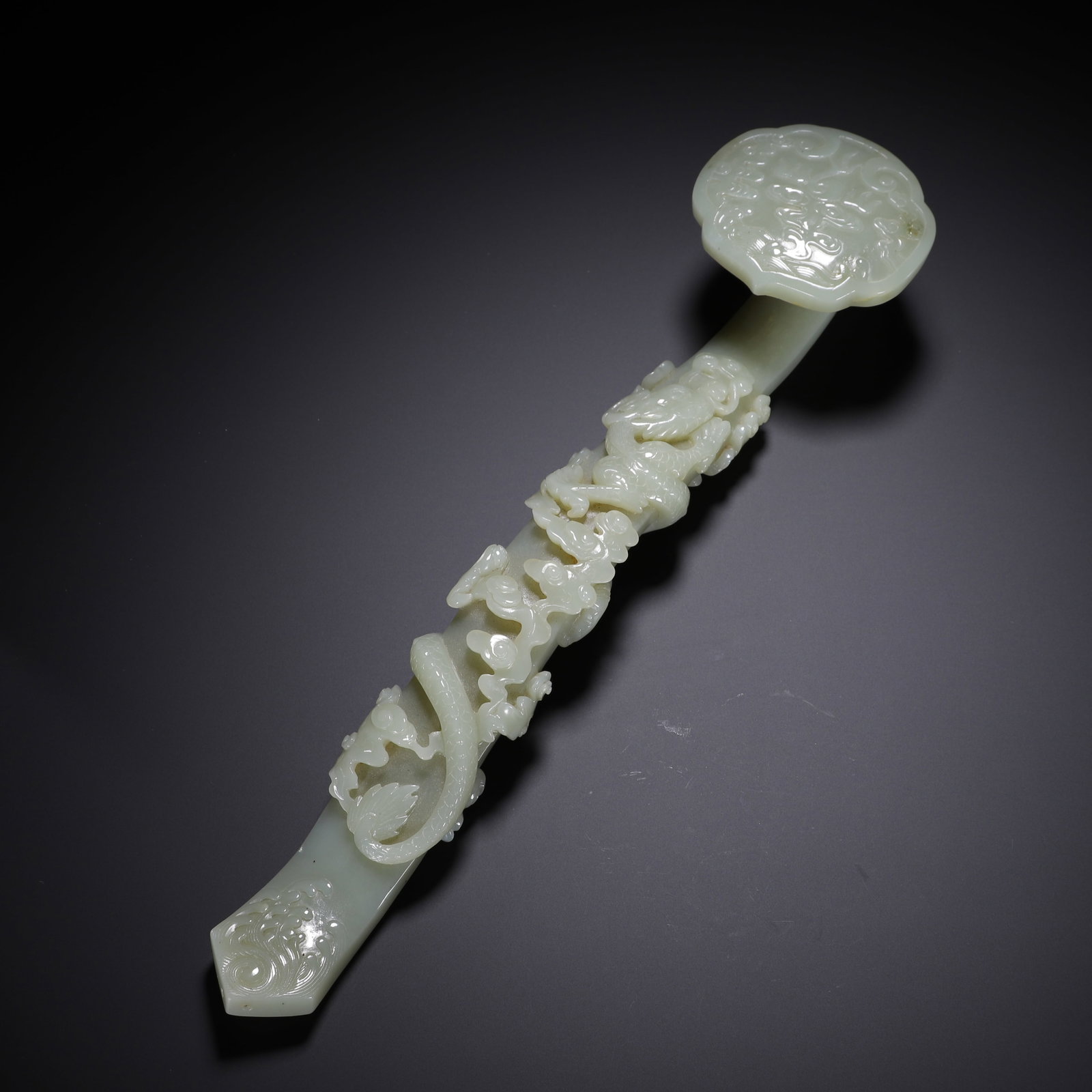 Hetian jade ruyi: Length 32cm, Width 7.5cm, Height 5cm, Weight 510g