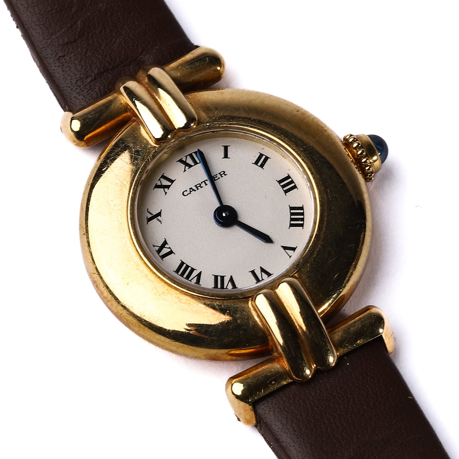 CARTIER-LADIES-WRISTWATCH,-18K-GOLD,-CIRCULAR-CASE: Diameter: 26.9 mm; Overall length: 20.5 cm; Weight: 22.7 g A classic Cartier ladies wristwatch featuring a circular case crafted in 18K yellow gold. The cream-colored dial displays black Roman numeral