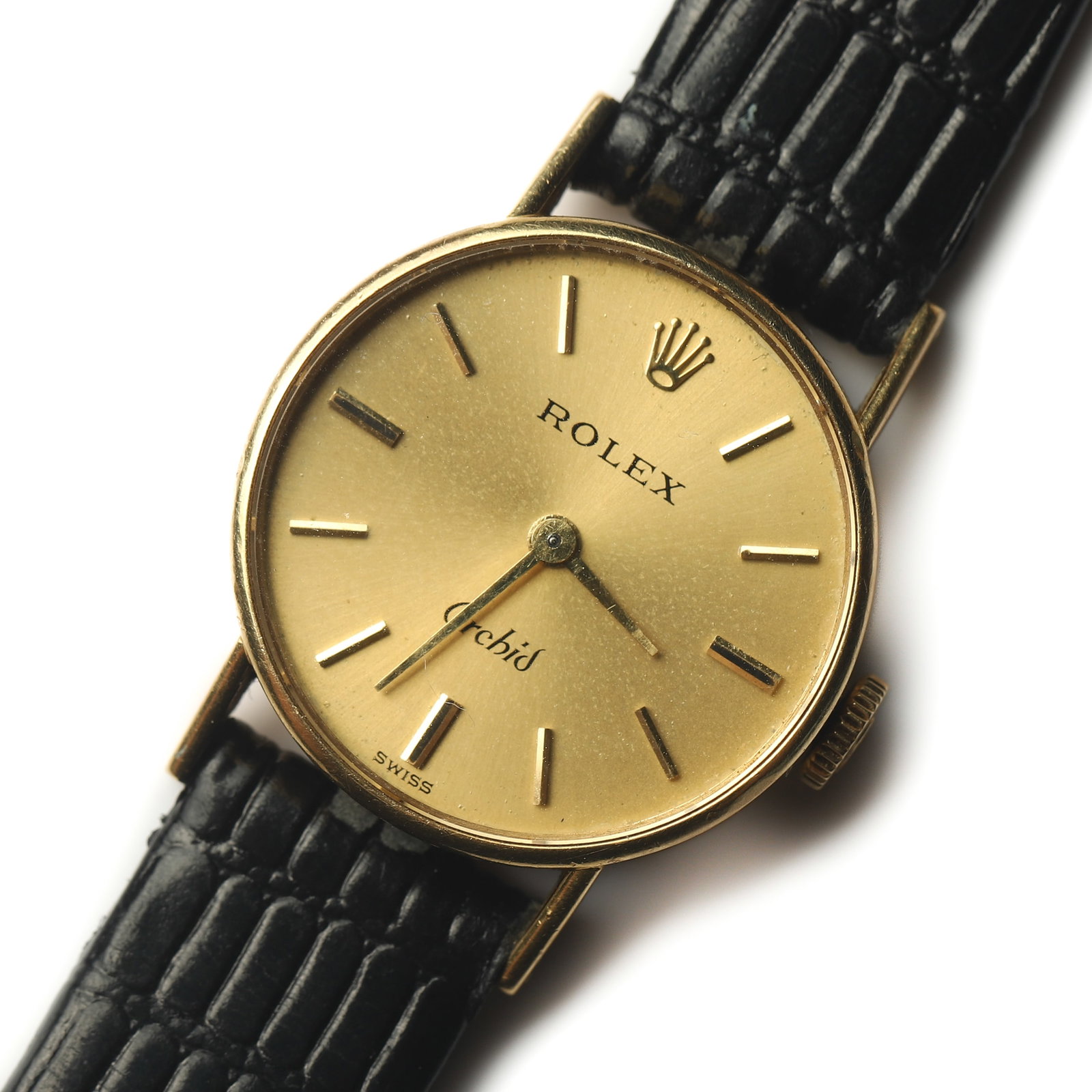 ROLEX-ORCHID-18K-GOLD-LADY'S-WRISTWATCH: Dimensions Overall Length: 8 3/8 in. (21.3 cm) Case Diameter: 7/8 in. (2.22 cm) Weight: 16.8 g Description A vintage Rolex Orchid lady's wristwatch crafted in 18K yellow gold, featuring a classic