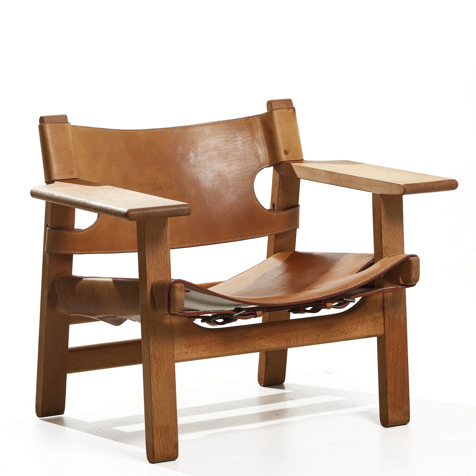 BORGE-MOGENSEN-"SPANISH"-CHAIR-FOR-FREDERICIA-STOLEFABRIK,-SADDLE-LEATHER-AND-OAK: Dimensions Height 24 3/8 in. (62 cm), Seat height 12 3/16 in. (31 cm), Width 32 5/16 in. (82 cm) Description Designed in 1958 by Danish designer Børge Mogensen for Fredericia Stolefabrik, the