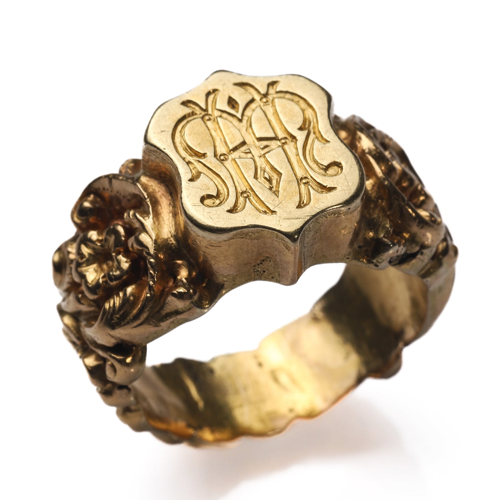 GEORGIAN-PERIOD-HIGH-KARAT-GOLD-ROCOCO-MONOGRAM-SIGNET-RING: Dimensions Hong Kong size 16 weight 7.9g Description An elegant Georgian-period high-karat gold signet ring, designed in the Rococo taste with an ornate monogrammed bezel. Finely executed in hollow