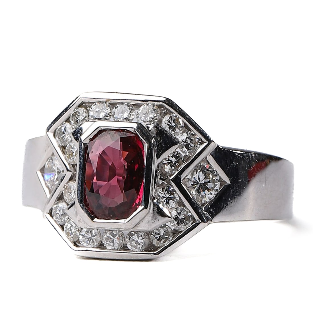 SALVINI-NATURAL-RUBY-AND-DIAMOND-RING: A luxurious Salvini ruby and diamond ring, crafted in 18K white gold. The ring features a stunning natural ruby measuring approximately 1/4 × 3/16 in. (6.5 × 4.5 mm) as the centerpiece, surrounded