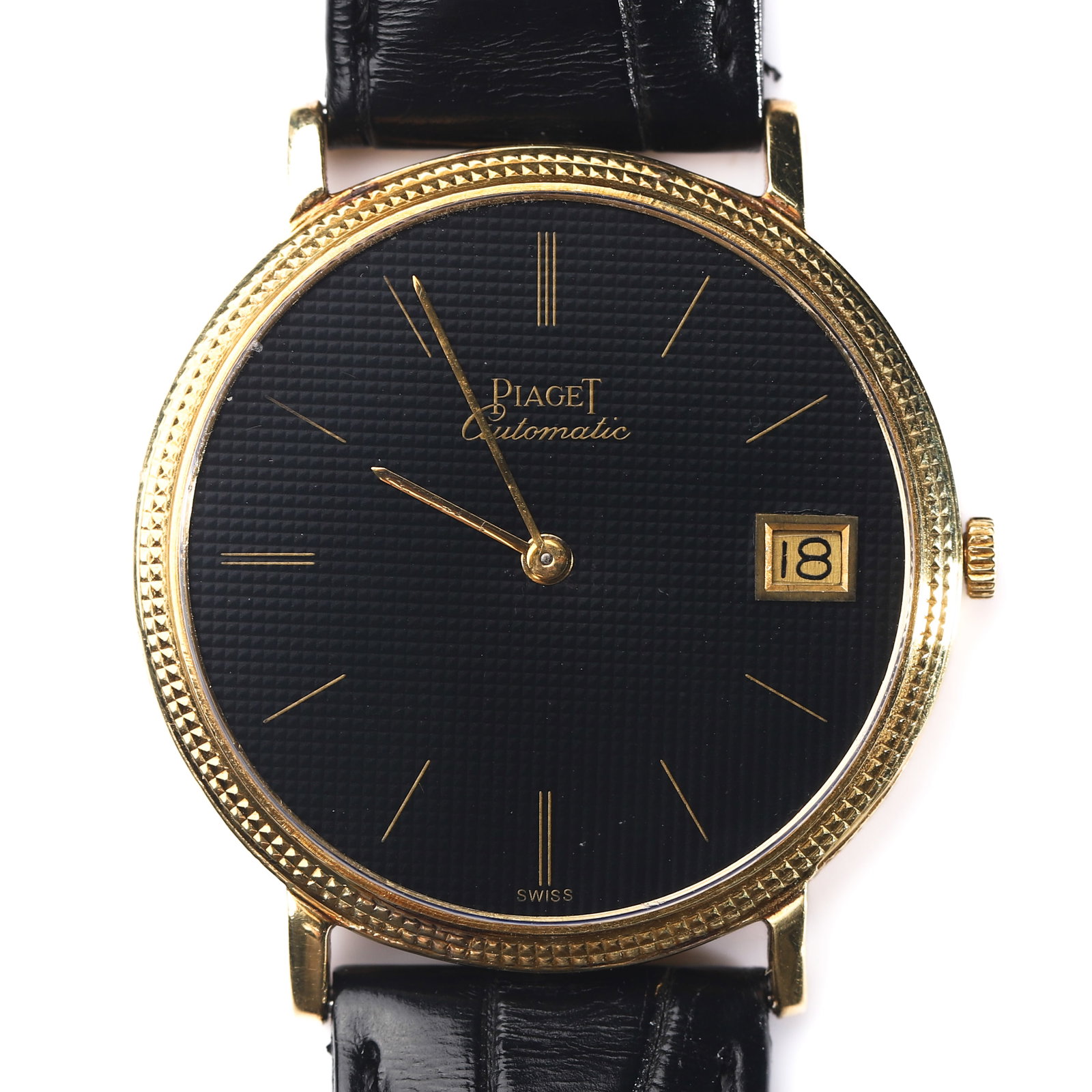 PIAGET-AUTOMATIC-GOLD-WRISTWATCH: Dimensions: Case diameter: 1 5/16 in. (33.4 mm); overall length approx. 8 15/32 in. (21.5 cm). Description An elegant Piaget automatic wristwatch featuring a finely textured black dial signed Piaget