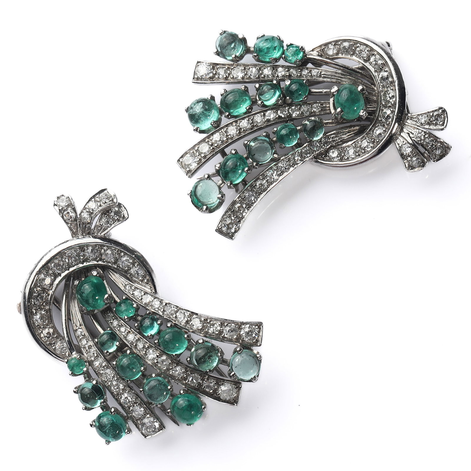 RETRO-PERIOD-PLATINUM-DIAMOND-AND-EMERALD-DOUBLE-CLIP-BROOCH: Each clip 1 9/16 × 1 1/8in. Total weight 33.33g Description An elegant Retro-period platinum diamond and emerald double-clip brooch, finely handcrafted in platinum and set with 96 antique-cut