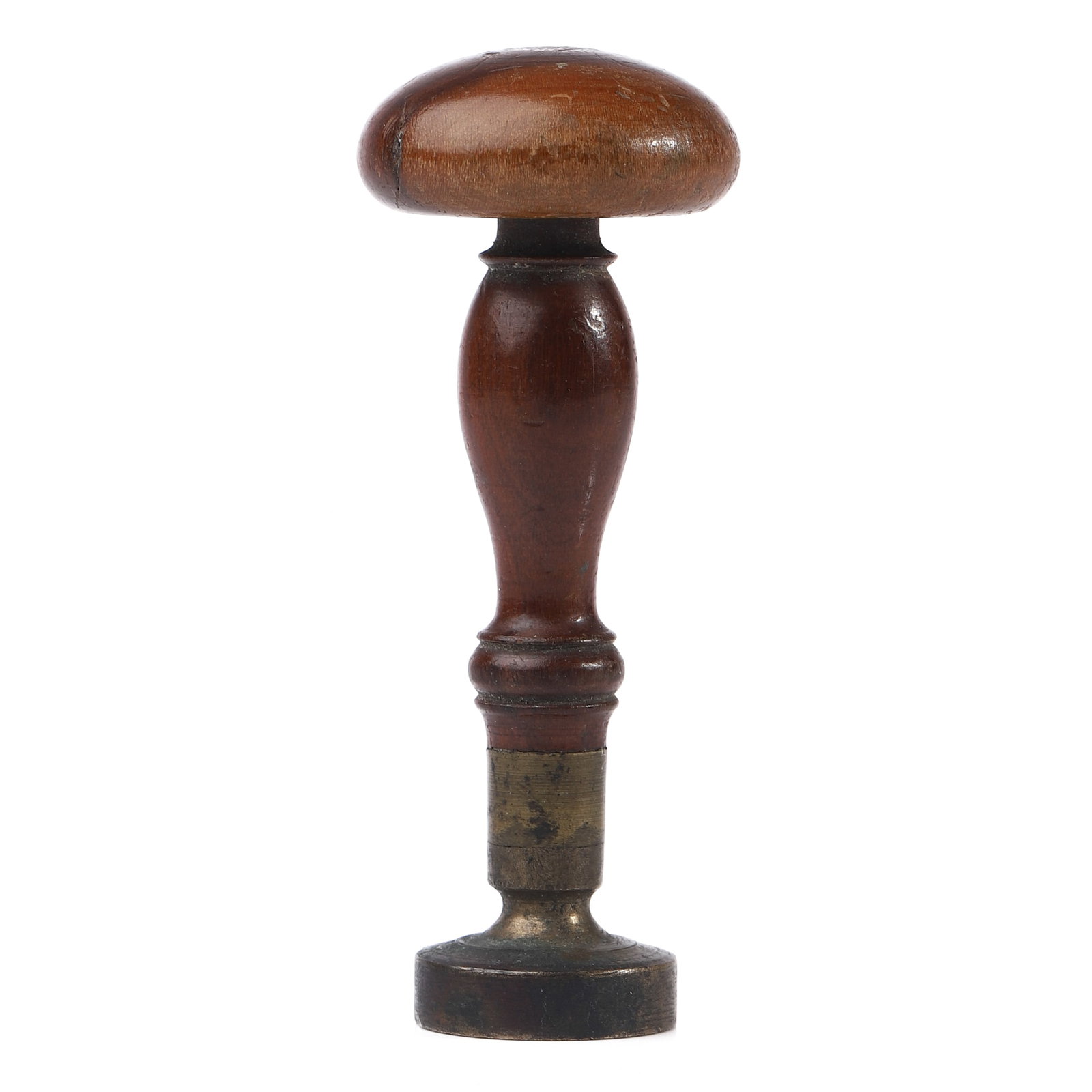 A-WOOD-AND-BRASS-MONOGRAM-SEAL: Dimensions Height 3 1/8 in (7.9 cm); Weight 37.4 g. Description A wood-handled desk seal fitted with a brass matrix engraved with an ornate monogram surrounded by decorative scrollwork. The turned