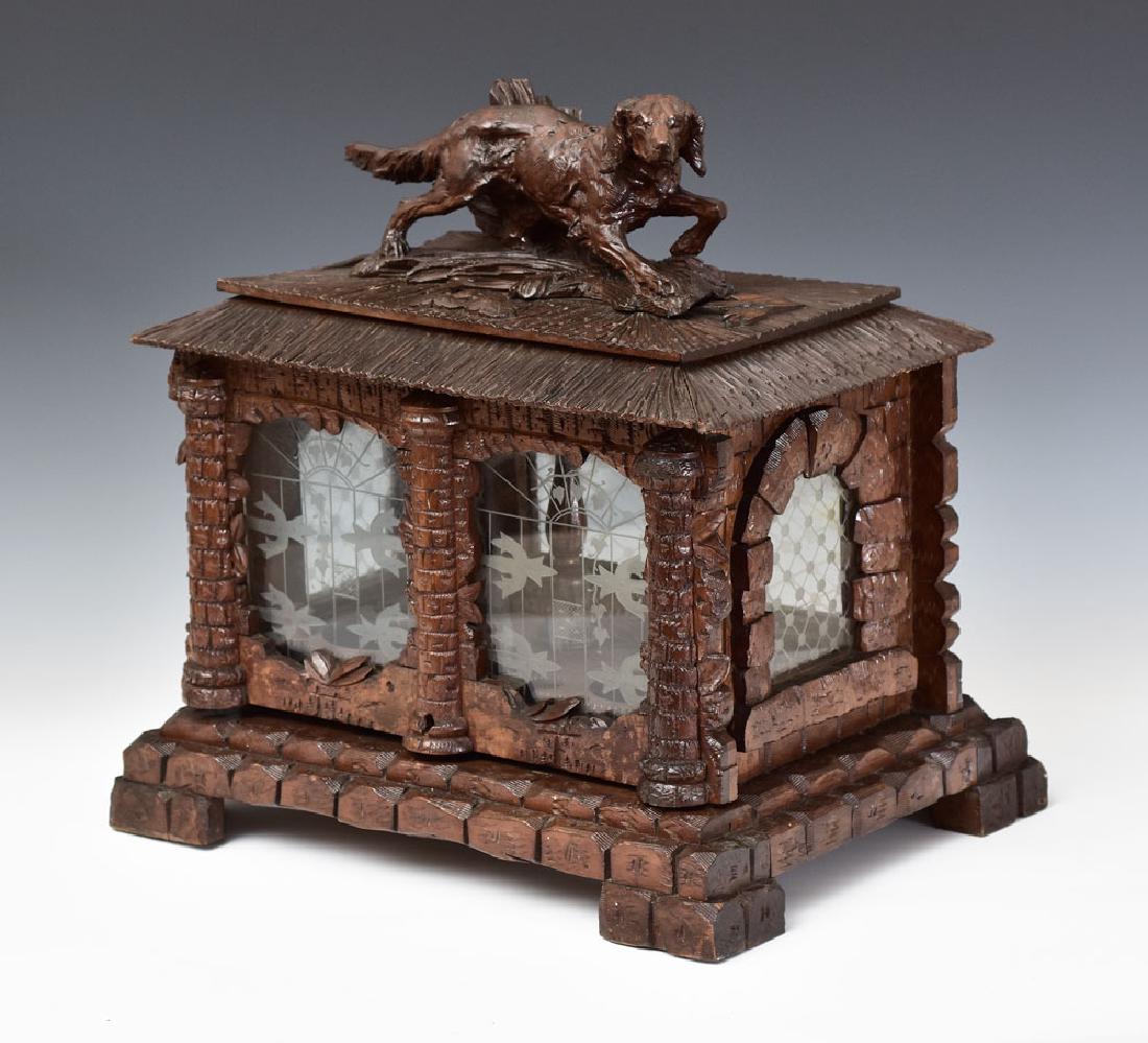 Black Forest Tantalus: with carved dog lacking bottles/glasses 13" x 17 1/2", 17" high late 19th century