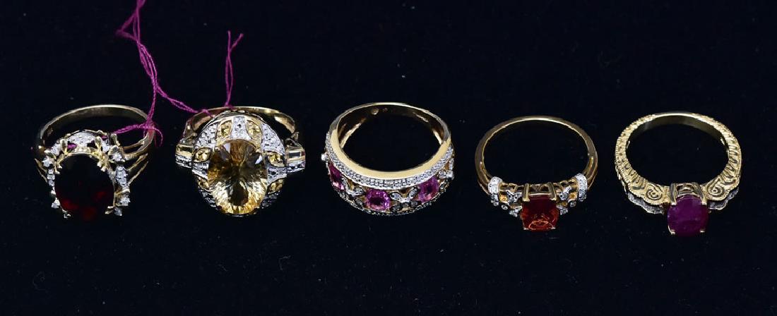 Five 10k Gold Rings: including ruby, kunzite and garnet ring sizes 7 to 8 13.7 dwt gross