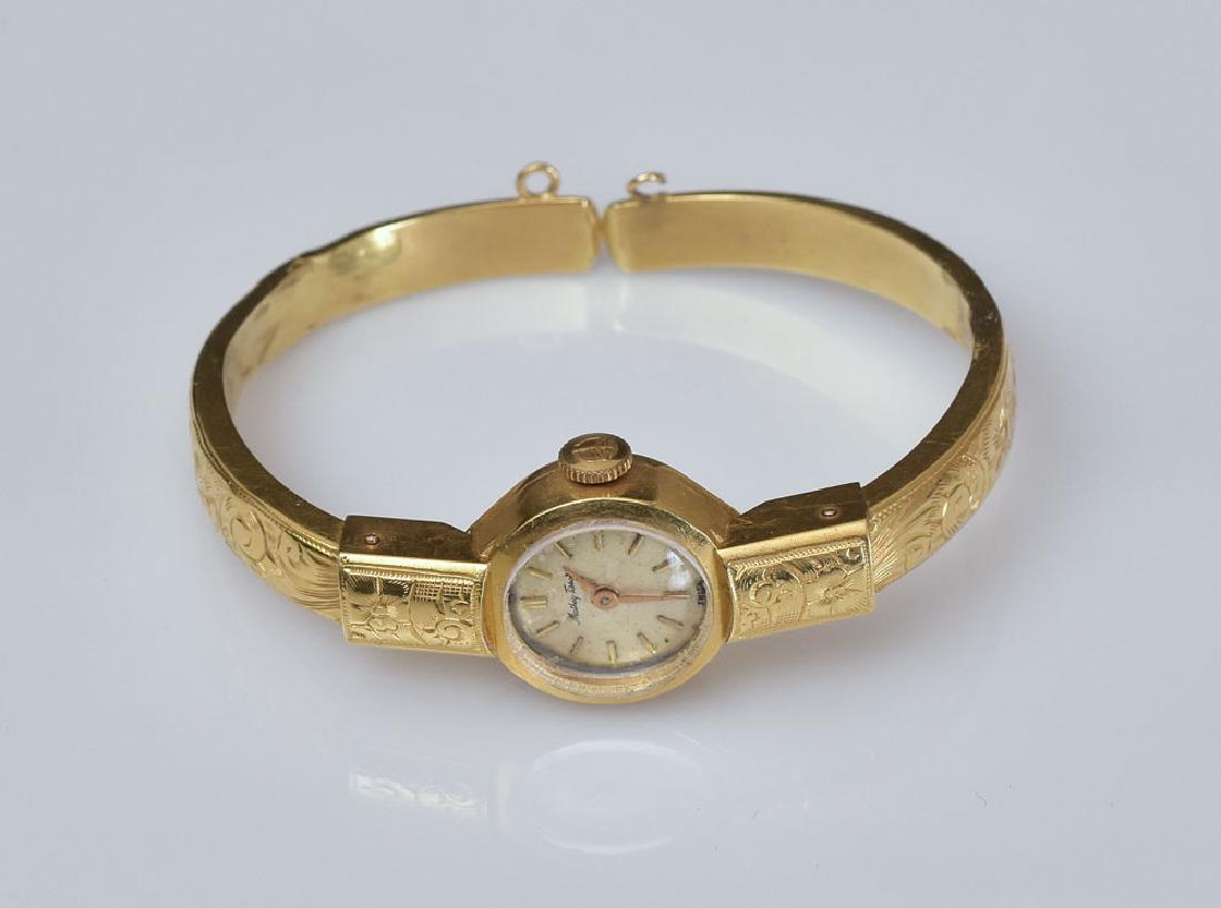 18k Gold Tissot Ladies Wrist Watch: with engraved bracelet in the original box 6 1/4" wrist size, 8.6 dwt gross