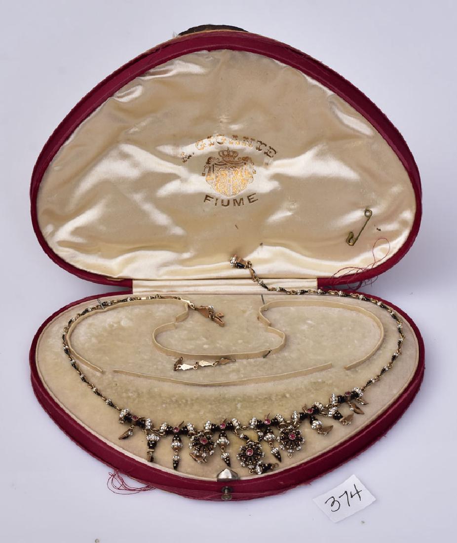 14k Gold Moretti Style Necklace: with enameled slave heads 15 1/2" long, 20.4 dwt gross circa 1900