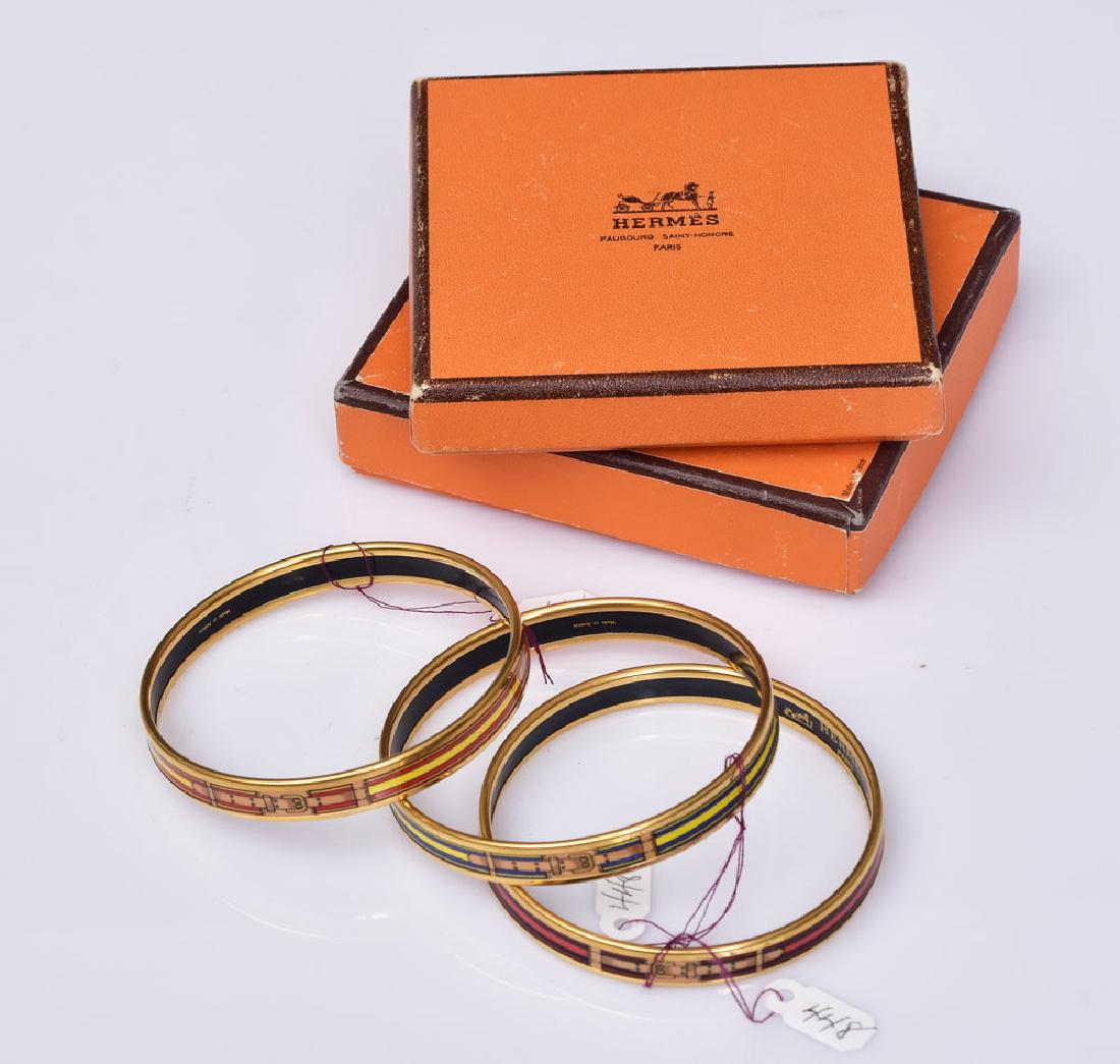Hermes Enameled Cuff Bracelets (3): with buckle design 9" cuff, all signed "Hermes/Paris/ Made in Austria", in a Hermes box