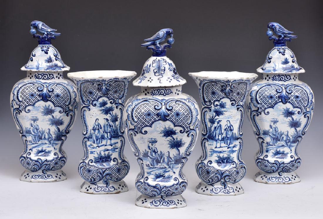 Delft Blue and White Garniture Set: five pieces consisting of three covered jars and two vases largest 18 1/2" high signed 19th century