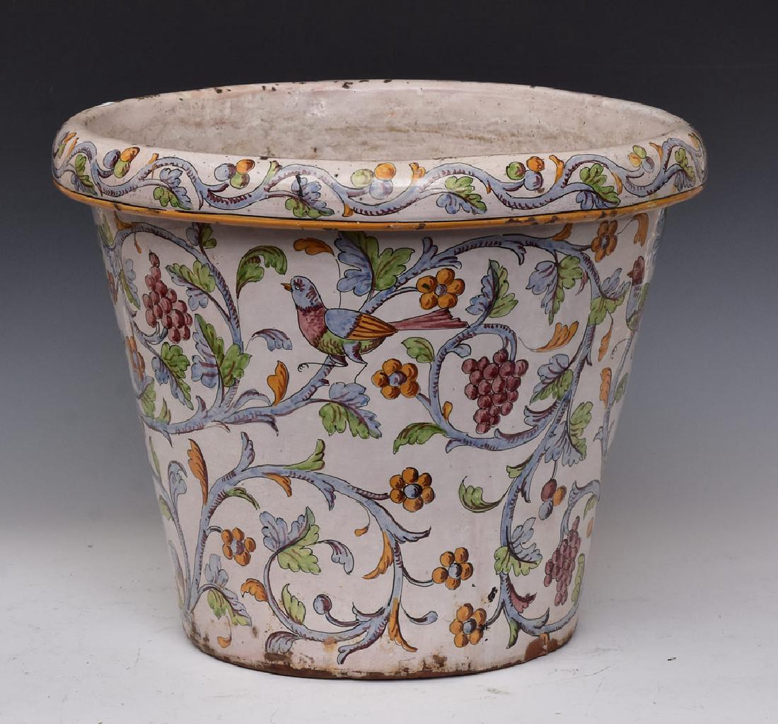 Continental Faience Jardinaire: decorated with birds, grapes and flowers 15" high late 19th/early 20th century