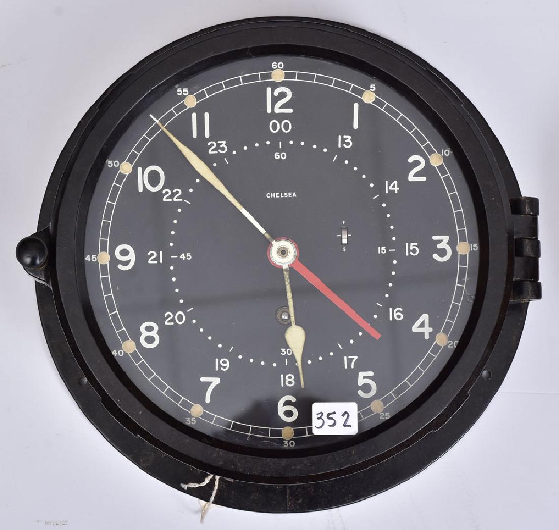 Chelsea Ship's Bell Clock: with black dial, and black case 10" diameter, serial number 836482 SHIPPING: Shipping available within the Continental USA (excludes insurance) $45. International buyers are responsible for arranging