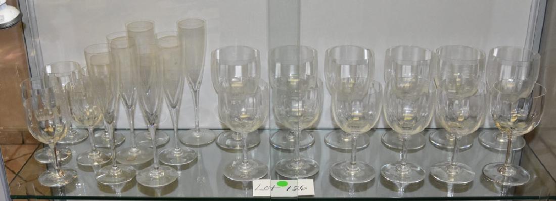 Baccarat Stemware: 23 pieces. Set consists of: 6 champagne (9 1/8" high) and wine glasses, 5 (5 3/4" high), 6 (6 1/4" high) and 6 (7" high)