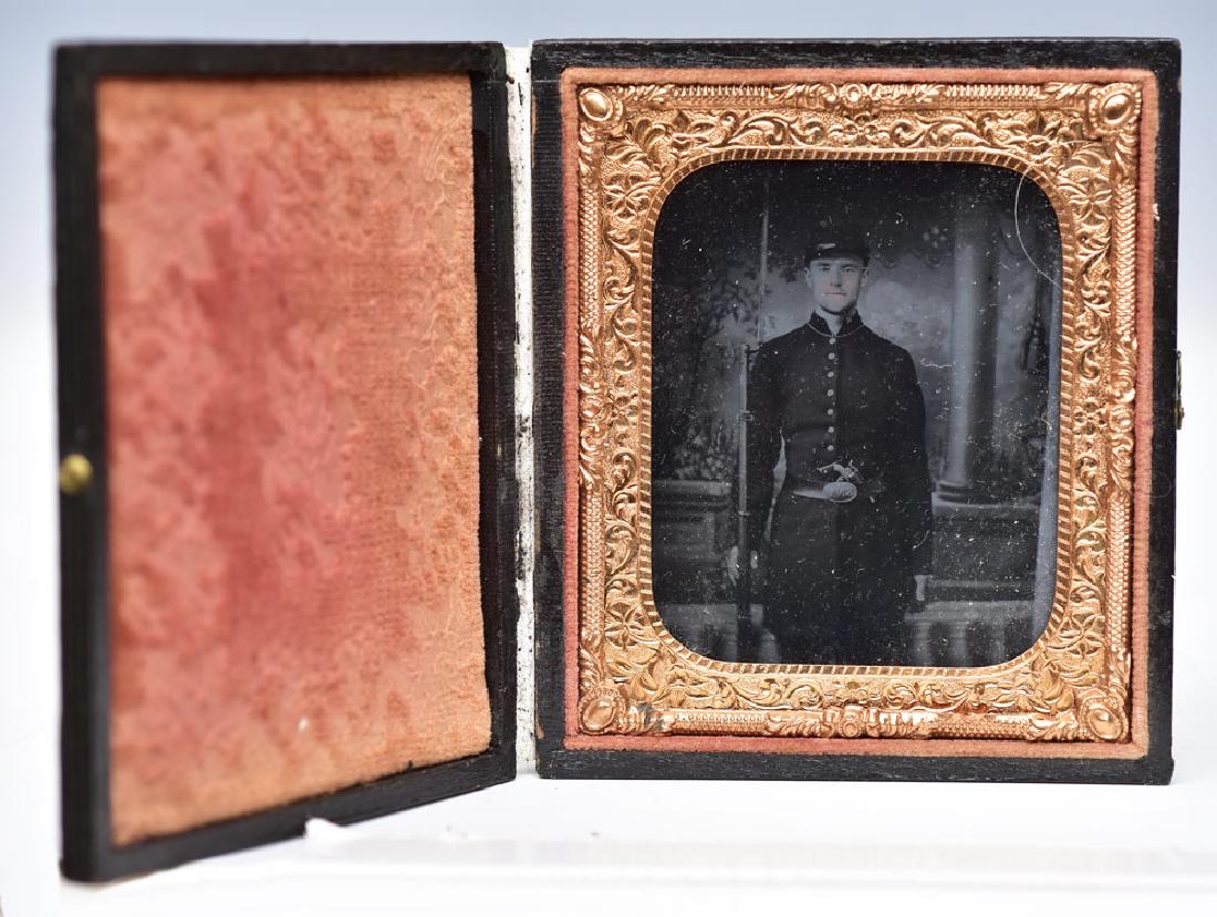 Civil War Tin Type Photograph: sixth plate of young soldier with bayonet, rifle revolver and "SNY" buckle