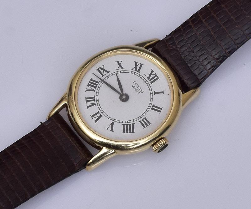 Concord 14k Gold Ladies Wrist Watch: 23 mm on a leather band