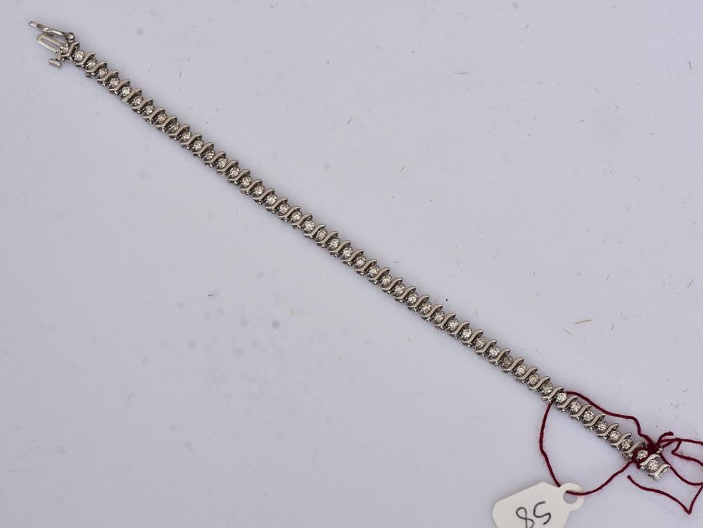 14k Gold Diamond Tennis Bracelet: 7" long, 6.0 dwt gross