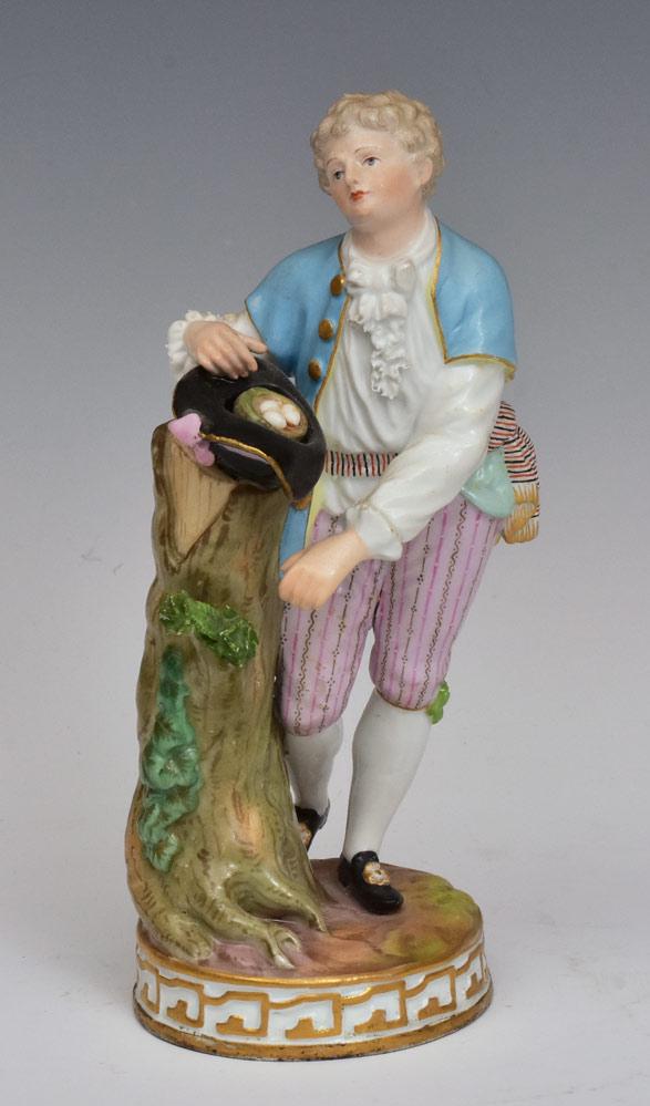 Meissen Porcelain Figure: Man Collecting Eggs 7" high with crossed swords Meissen mark