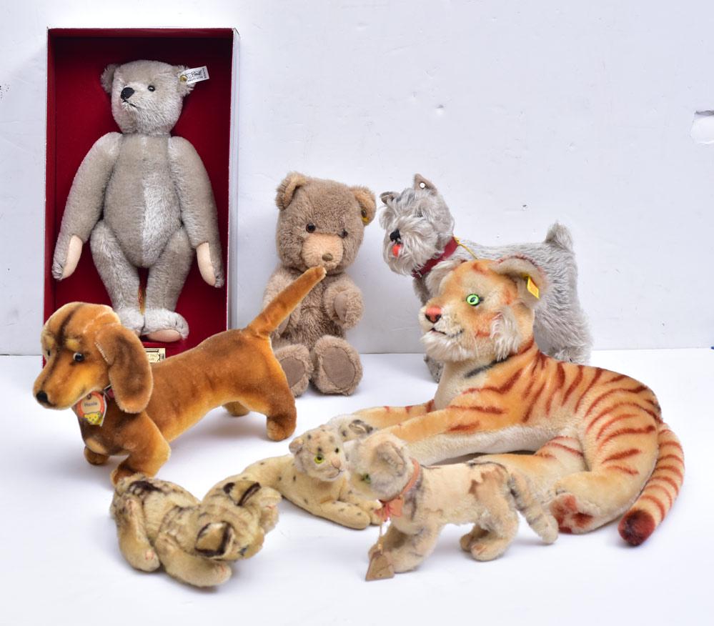 Steiff Stuffed Animals: Boxed Mohair Teddy Bear, 12" high, Tiger, 8" high "Hexie" the Dachshund, 7 3/4" high, Dog and Teddy Bear, all marked Steiff. Together with Three Cats, two are unmarked, one marked Dakin
