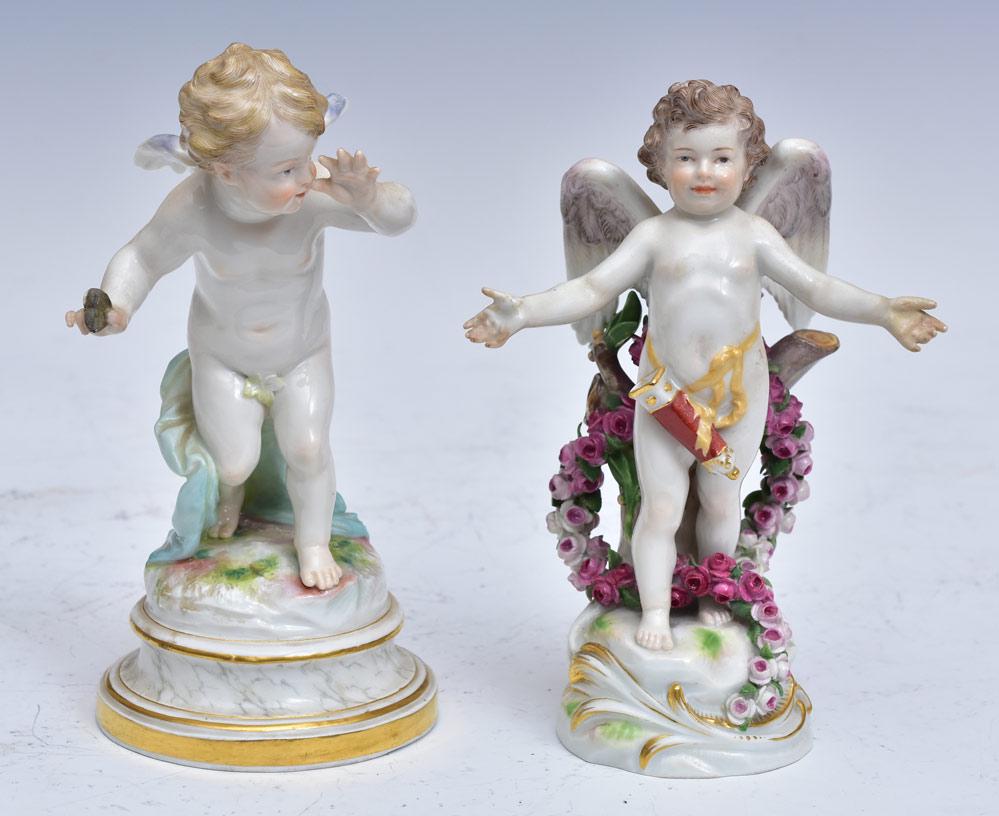 Two Meissen Porcelain Cherubs: 7 1/2" and 7" high with crossed sword Meissen marks
