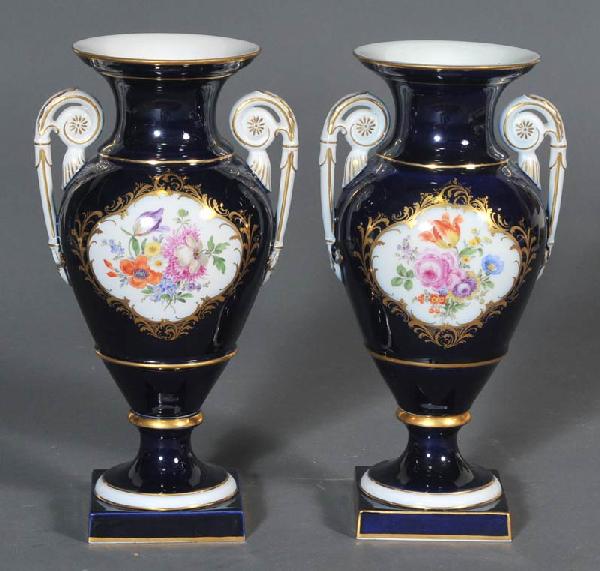 PAIR OF MEISSEN PORCELAIN URNS cobalt blue with flo: PAIR OF MEISSEN PORCELAIN URNS cobalt blue with floral panels 11 1/2" high SHIPPING: International shipping through a third party shipper. Packing & shipping within the Continental USA available throu