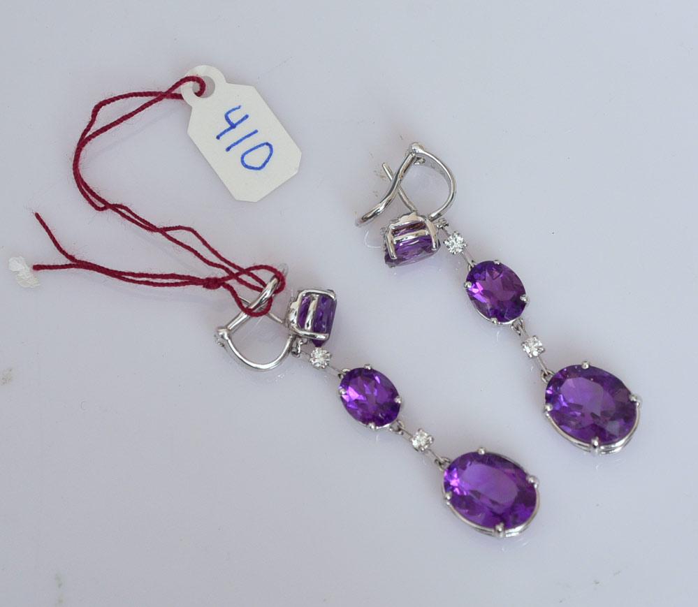 Antonini 18k Gold Amethyst and Diamond Earrings: each earring set with three amethysts and two diamonds, 2" long for pierced ears 7.6 dwt gross, stamped .750, Antonini