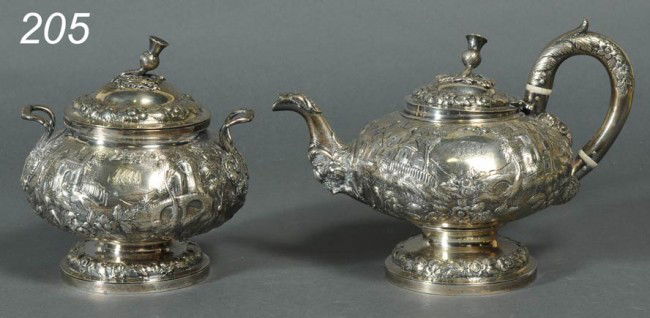 AMERICAN COIN SILVER REPOUSSE TEAPOT AND SUGAR JAR: AMERICAN COIN SILVER REPOUSSE TEAPOT AND SUGAR JAR each stamped "A.E. Warner" circa 1850