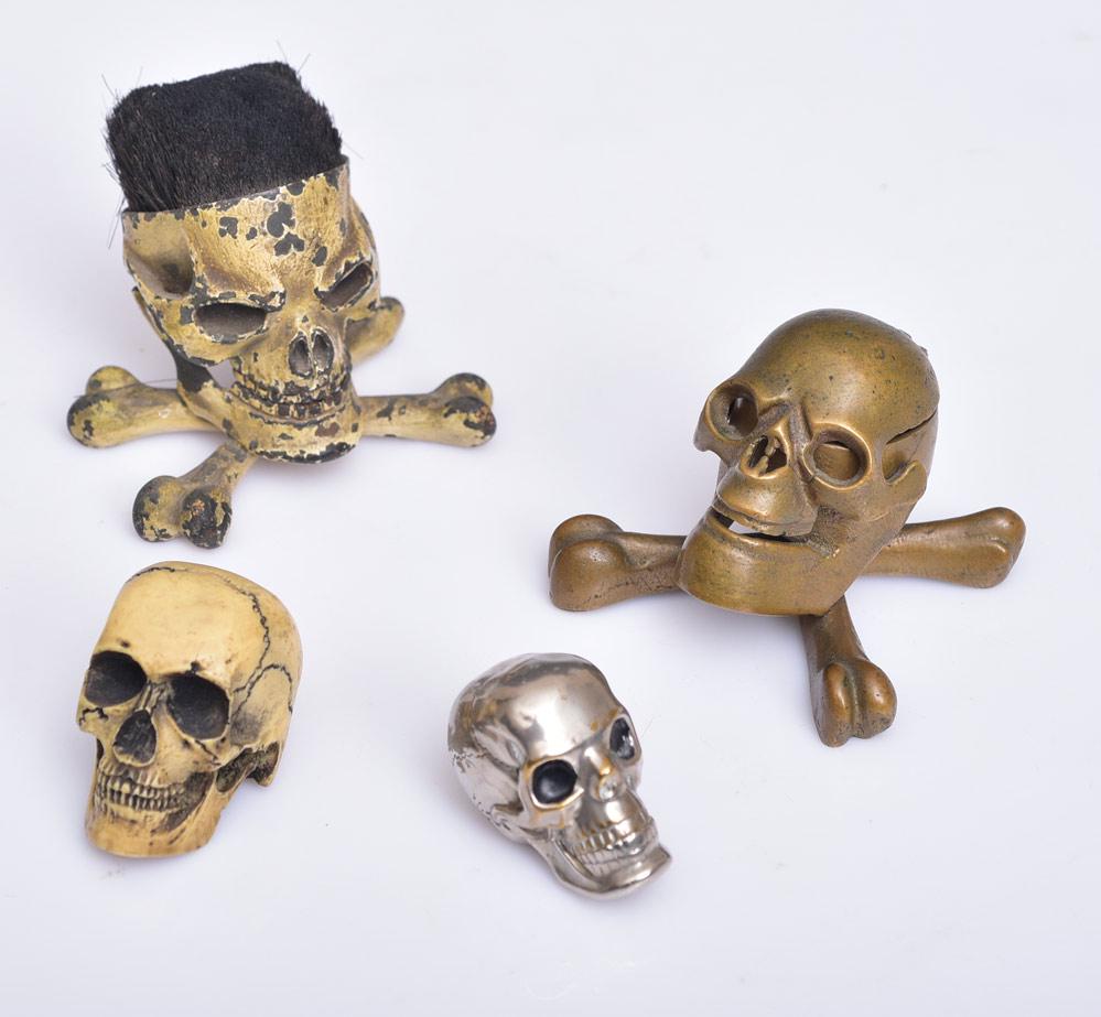 Victorian "Skull" Desk Pieces: bronze ink well, silverplated match strike, bone skull paperweight and pen wipe, 2 3/4" high late 19th/early 20th century