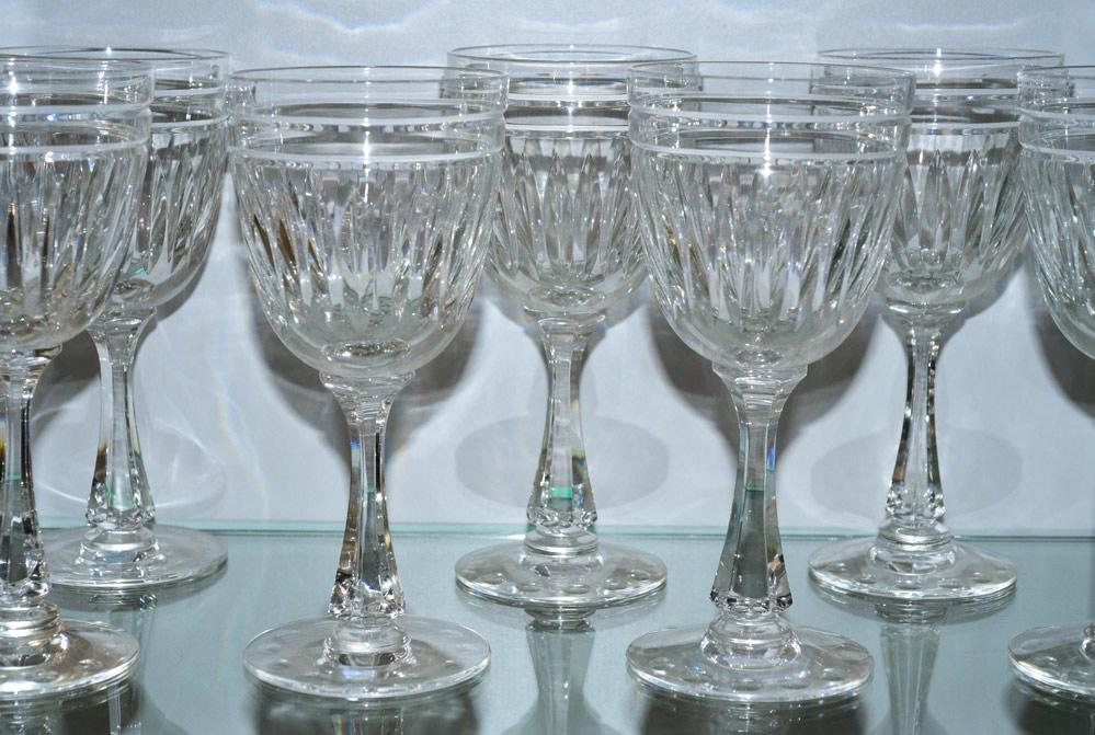 Hawkes Crystal Stemware (34): twelve 7 1/2" wine glasses, thirteen 6" champagne, and nine 6 1/2" small wine glasses with "HAWKES" mark