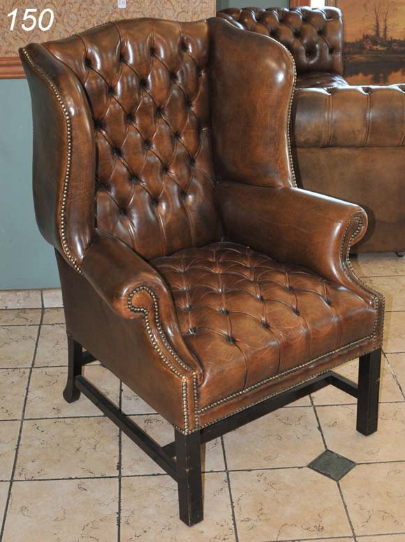 BROWN LEATHER TUFTED WINGBACK CHAIR 44" high: BROWN LEATHER TUFTED WINGBACK CHAIR 44" high