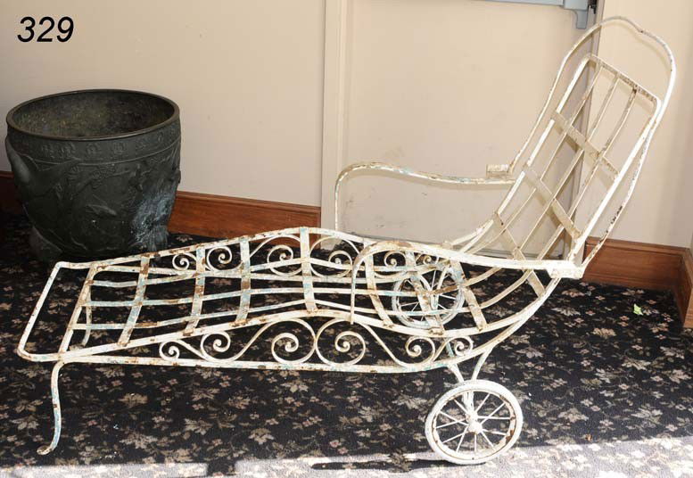 WROUGHT IRON GARDEN CHAISE LOUNGE, circa 1940: WROUGHT IRON GARDEN CHAISE LOUNGE, circa 1940