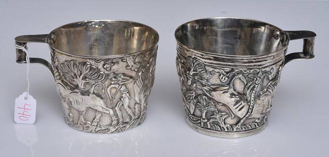Ilias Lalaounis Grecian Sterling Silver Cups (2): with repousse decoration of bulls, 3" and 3 1/4" high marked "Lalaounis/925" 11.9 troy ounces