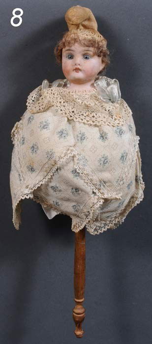 MUSICAL DOLL ON A STICK overall 14" high, late 19th: MUSICAL DOLL ON A STICK overall 14" high, late 19th century Shipping Information: Shipping within the Continental USA (excluding insurance) $25