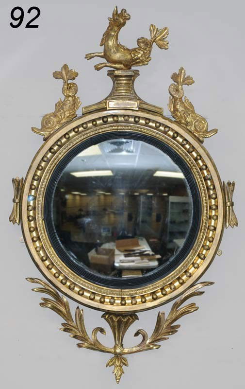 REGENCY GILTWOOD CONVEX MIRROR surrmounted with a h: REGENCY GILTWOOD CONVEX MIRROR surrmounted with a hippocampus 47" high circa 1810 Shipping Information: Buyer is responsible for arranging shipping.