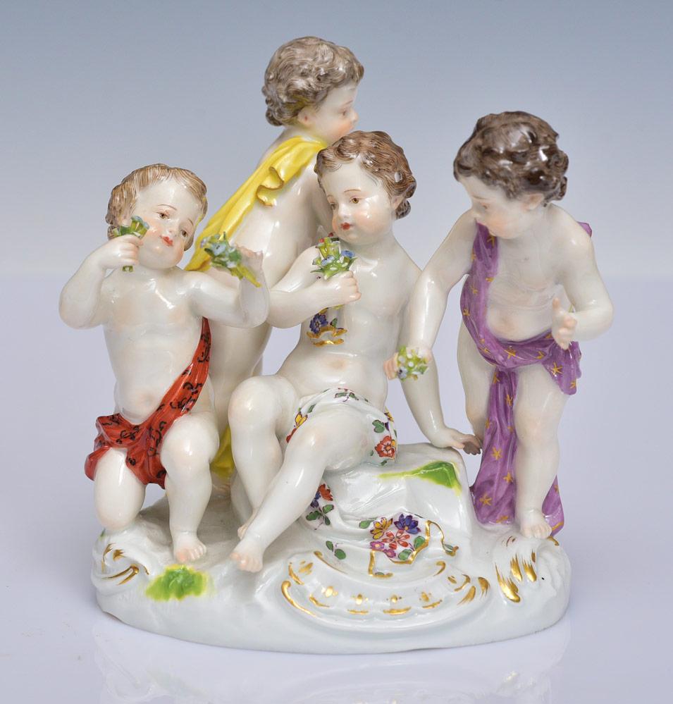 Meissen Porcelain Figure: Four Putti with Flowers 5 1/4" high signed with Meissen crossed sword mark