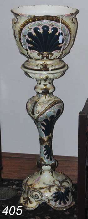 MAJOLICA JARDINAIRE AND PEDESTAL 46" high overall : MAJOLICA JARDINAIRE AND PEDESTAL 46" high overall late 19th century Shipping Information: Buyer is responsible for arranging 3rd party shipping