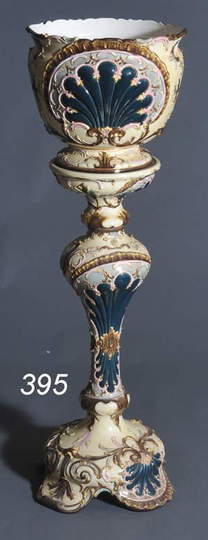 MAJOLICA JARDINAIRE AND PEDESTAL 46" high overall : MAJOLICA JARDINAIRE AND PEDESTAL 46" high overall late 19th century Shipping Information: Buyer is responsible for arranging 3rd party shipping