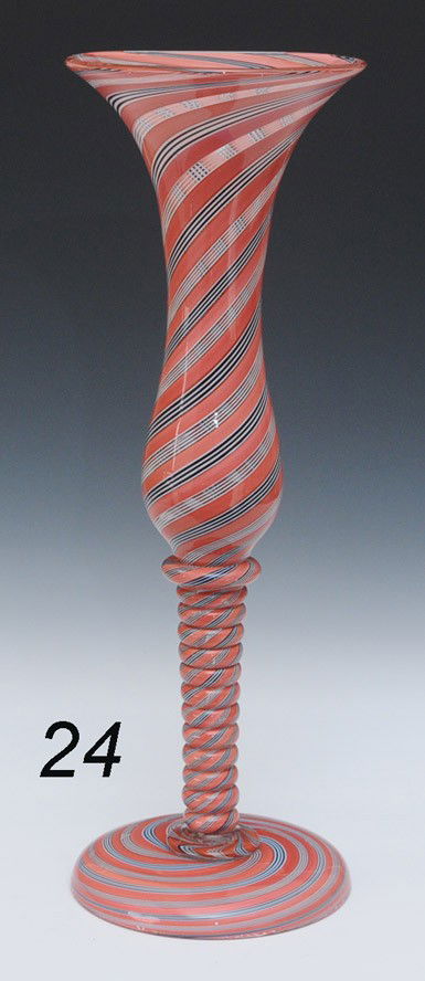 LARGE AND FINE RIBBON GLASS VASE probably French wi: LARGE AND FINE RIBBON GLASS VASE probably French with twisted standard, 18 1/2" high late 19th century Shipping Information:$50 Packing and shipping available within the Continenal USA (excludes insur