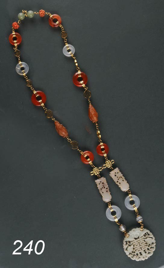 CHINESE 14K GOLD JADE NECKLACE with jade pendant,: CHINESE 14K GOLD JADE NECKLACE with jade pendant, agate and carnelian, Pendant is 2 1/8" diameter. Shipping Information:$20 Packing and shipping available within the Continenal USA (excludes insurance