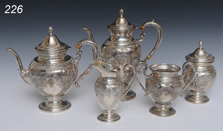 WHITING STERLING SILVER TEA SET (5) with repousse: WHITING STERLING SILVER TEA SET (5) with repousse decoration 97 troy ounces early 20th century Shipping Information: Shipping within the Continental USA (excludes insurance which will be added based