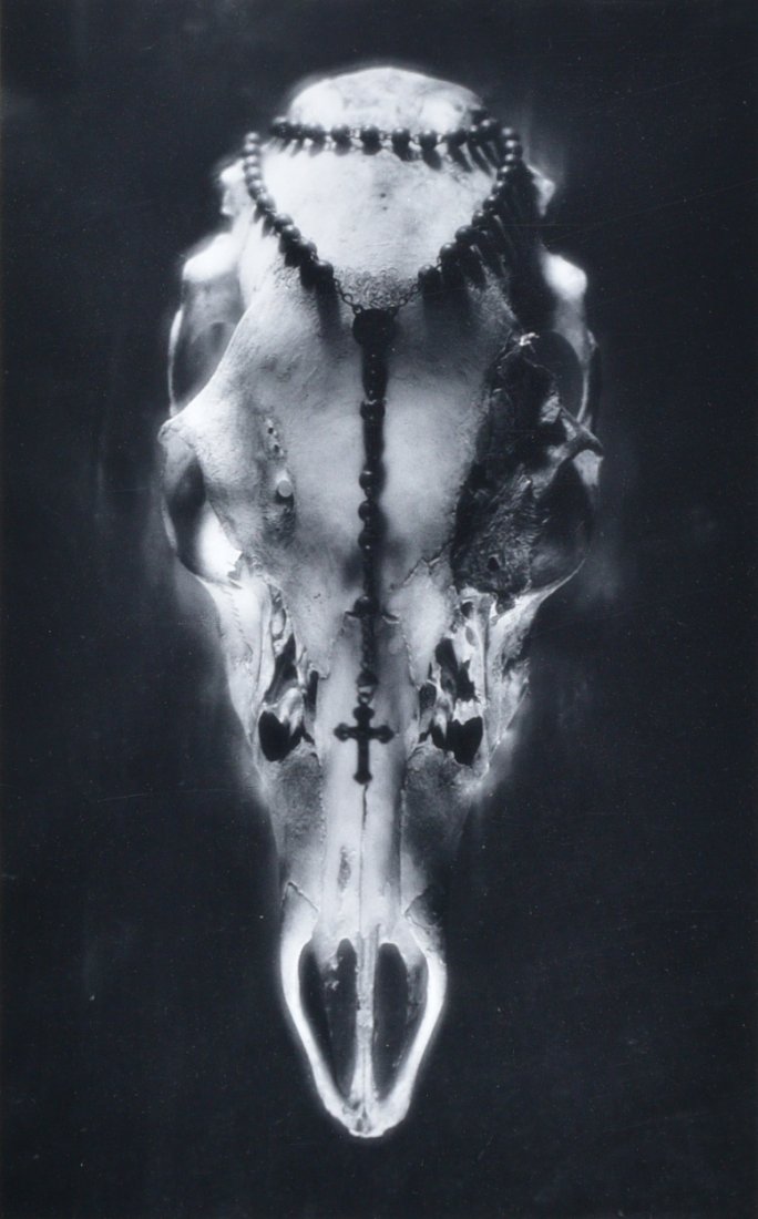 Ruth Bernhard: Skull and Rosary, 1945, 13 3/4" x 8 3/8" Gelatin silver print, printed later, Signed on the mount lower right