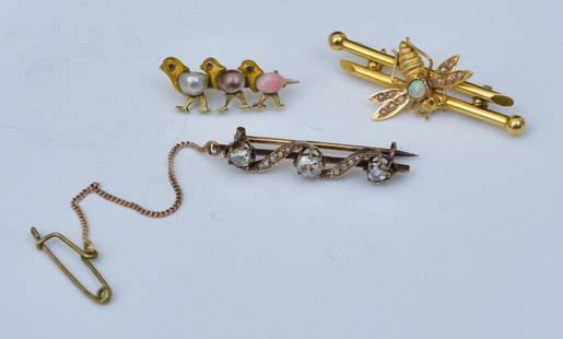 18k and 14k Gold Victorian Brooches: 14k gold diamond brooch set with three rose cut diamonds, approximately .90 ct tw, and two 18k gold figural brooches brooches, Chicks set with pearls and Bee set with seed pearls and opal, the largest